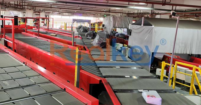 Realkey مرتب کننده کمربند متقاطع in operation at distribution center